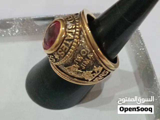 خاتم مطلي بالذهب عيار18حجر زفير أزرق  وحجر أحمر روبي