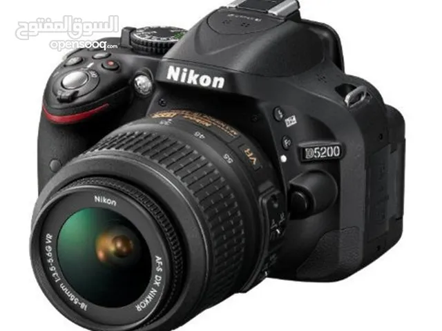 Nikon d5200 body with 2 lenses: 18-55mm and 55-200mm with rode mic.