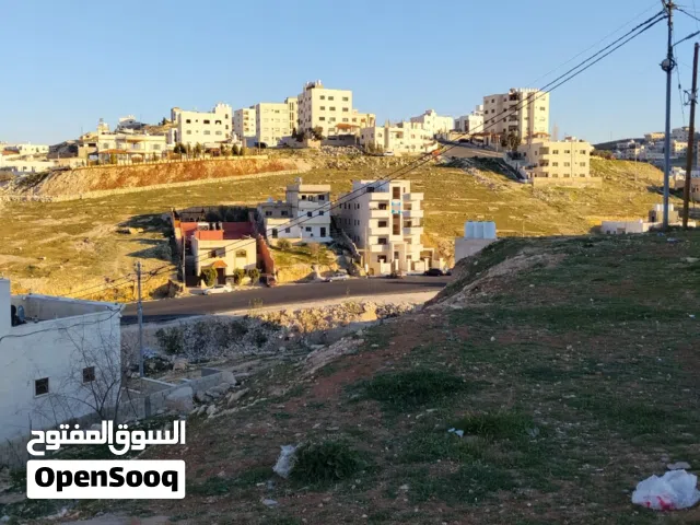 أرض للبيع بمنطقة أبو علندا على شارعين منطقة فلل