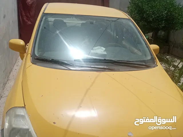 سيارة نيسان تيدا للبيع او مراوس2007 تكسي باسمي رقم بصره مكانها بكربلاء رقم ألماني