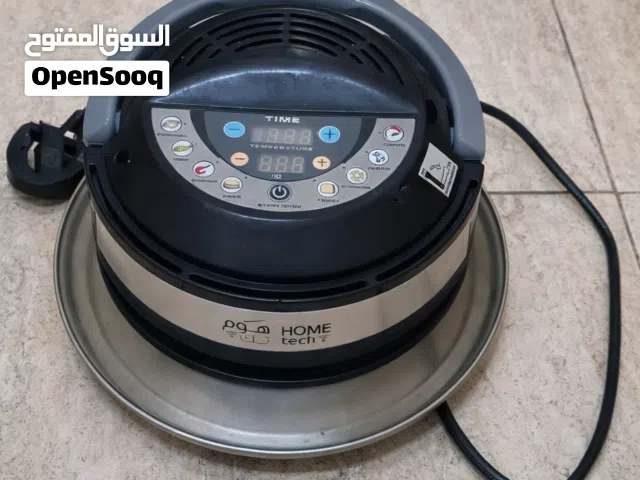 غطاء قلاية هوائية مصمم للوضع فوق أواني الطهي لتحويلها إلى قلاية.