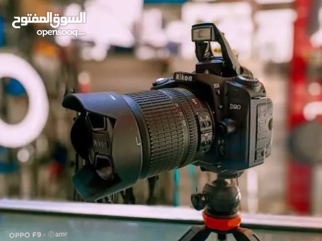 كامره نيكون d90 + زوم 300-700 رياضي وملحقاتهه