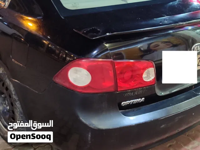 كيا اوبتيما  محرك 24  مارشه عادية  محرك كمبيو صالة ماشاءالله  سيرفس كامل  سعر 8.5  الف
