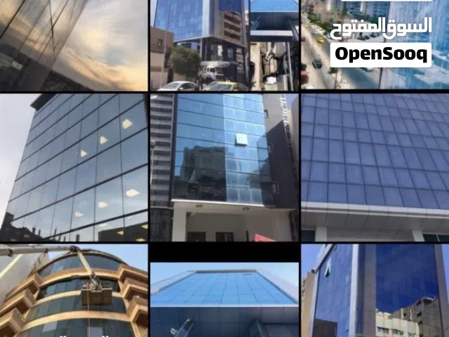 غسيل وتنظيف واجهات الزجاج للمباني