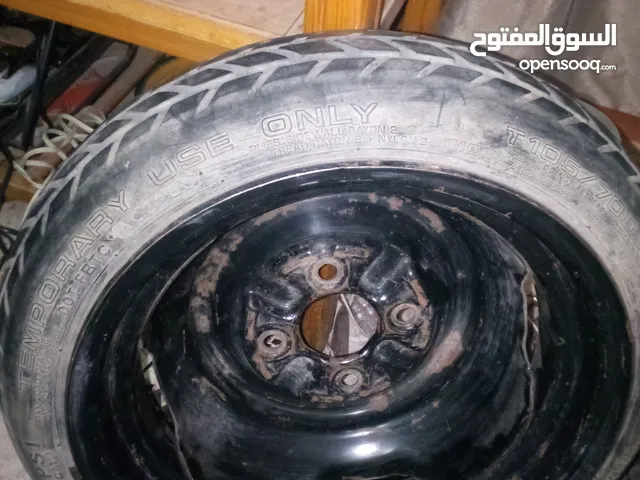 جنط مع كوشوك سبير بحال ممتاز قياس 14 ياباني اصلي شركه