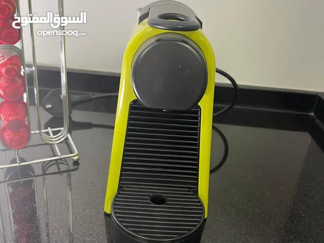ماكنه قهوه نوع Nespreso بحاله الجديده استعمال قليل جدا +هديه ستاند الكبسولات السعر 50 دينار
