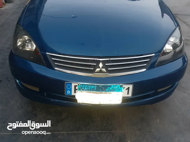 للبيع متسوبيشي لانسر سوبر اك مود2005 فتيس اوتوماتيك موتور 1600ccرخصة طويلة مرور الغربية ثاني مالك