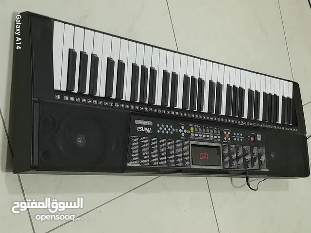 Barely used Wansa piano in great condition 61 key Lighting electronic key board.