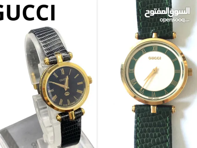 2 Gucci watches for urgent sale for travel reasons - made from crocodile leather - each watch is 200