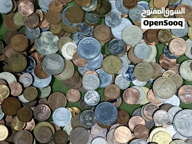 عملات معدنية اجنبية كمية كبيرة اوربية امريكية جنوب شرق آسيا وامريكيا الاتينية