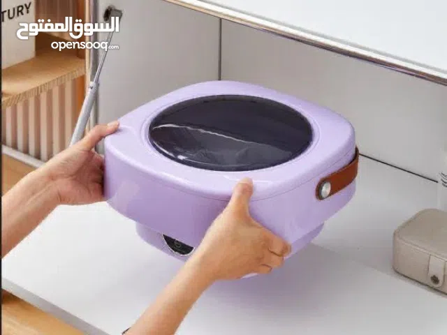 غسالة ملابس صغيرةمحمولة