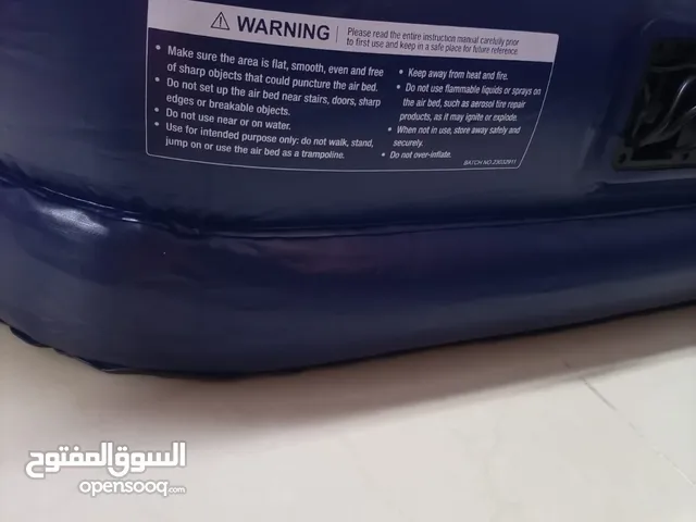 فرشة نفخ مع منفاخها