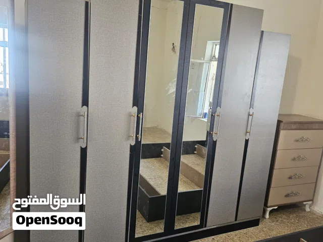 نجار عام فتح وشد انواع غرف النوم والابواب والجراجيب.