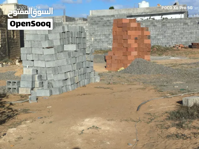 قطعه ارض في منطقه عين زاره شارع الهمبورجا بالتحديد جامعه النون