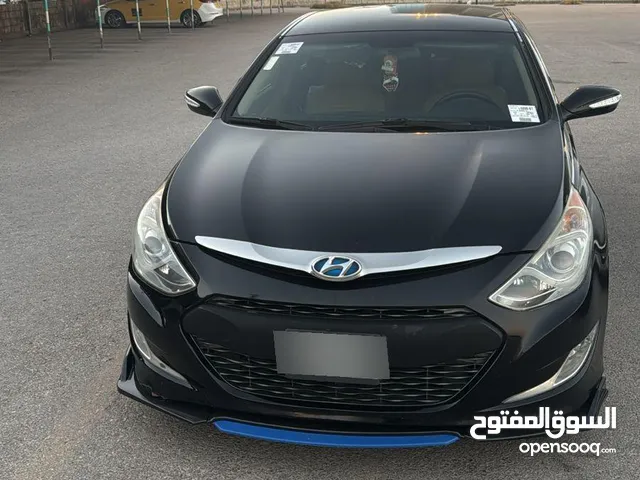 للبيع المستعجل هونداي سوناتا هايبرد امريكي 2012 لون اسود فل ما عدا الفتحة فحص كامل للبيع المستعجل