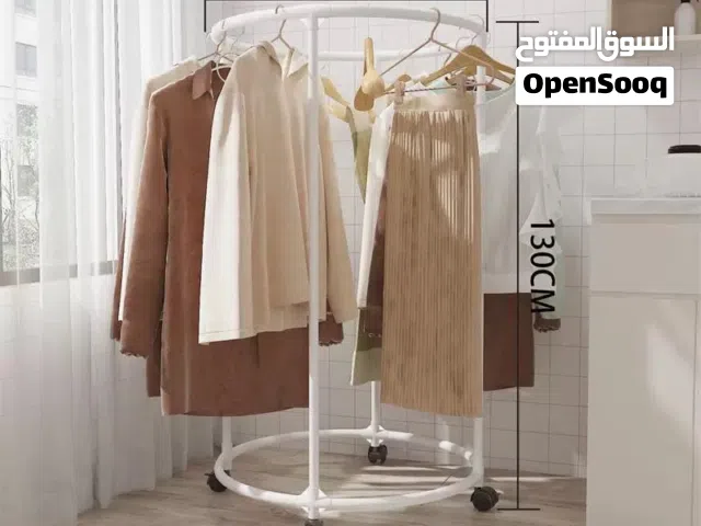 ستاند ملابس دهبي او ابيض