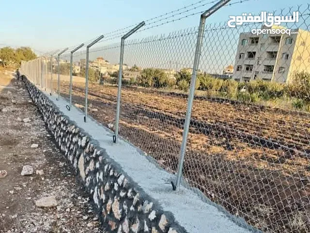 استصلاح الاراضي الزراعيه بناء السناسل الحجريه بناء سلاسل حجريه تشييك الاراضي زراعة الاشجار شبكات الر