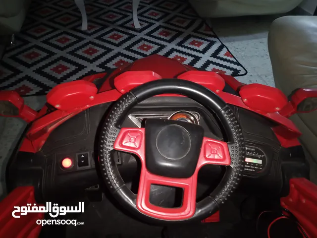 سيارة شحن للاطفال اللون الاحمر كبيرة الحجم كما موضح بالصور