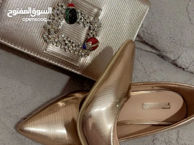 Ensemble sac a main avec des talon marque france