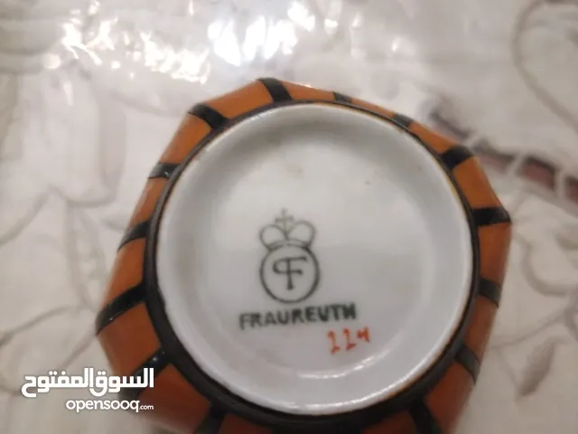 طقم فنجان المانى ملكى من الفضه والبورسلين نادرتحفه يتغير لونه بتغير الاضاءه فون