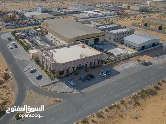 Warehouse complex for sale in Al Sajaa Area 89,680 sq ft Power 1000 kW Prime location