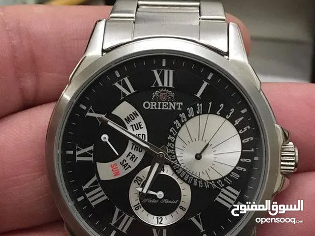 ساعة أورينت ياباني أصلي مئة بالمئة حجم كبير غير مستخدم مع العلبة