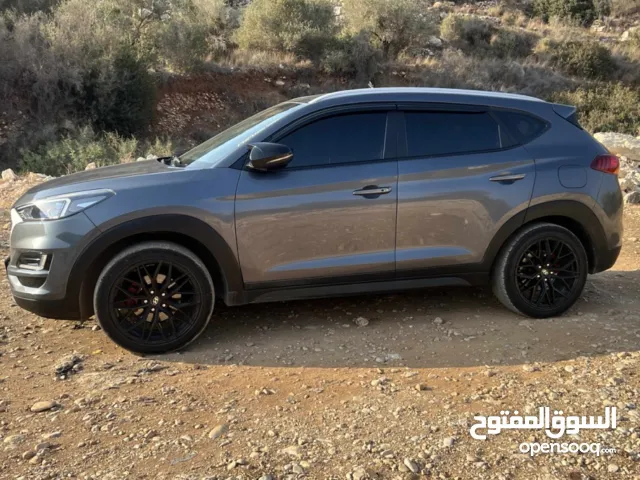 توسان 2020ترخيص19يد اولى فحص نخب لون مميز بصمة مع مفتاحين شركة بسعرر حرق