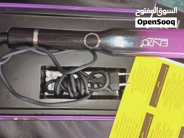 مكواة لتمليس الشعر بحاله ممتازه نوعENZO