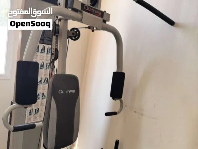 سير رياضي والة تمارين أثقال  وكرسي شد البطن