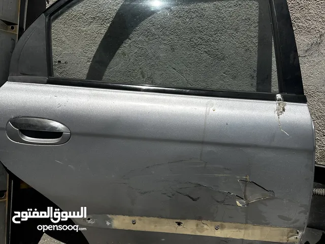 باب خلفي يمين وطمبونات كيا سبيكترا