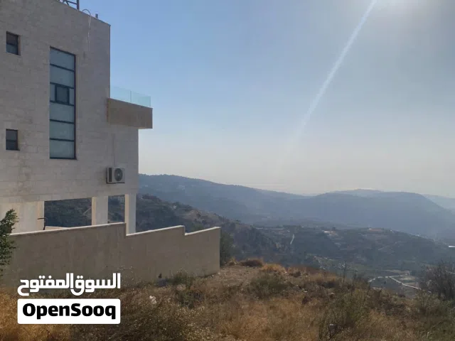 ارض 341م بأجمل مواقع ماحص على شارعين ومنطقة فلل