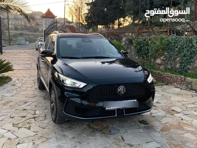 Mg zs ev2023 تكملة اقساط بدفعة 9000او البدل على سيارة اخرى