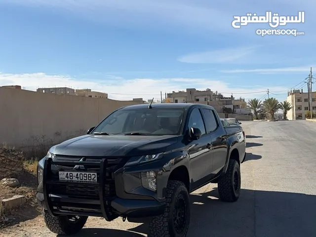 معدل Mitsubishi L200 sportero 2023 وارد و كفالة الوكالة اعلى صنف