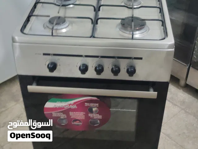 للبيع 2 طباخ 4 شعله مقاس 60 × 60 ابيض وستيل معا التوصل التشغيل والكفاله