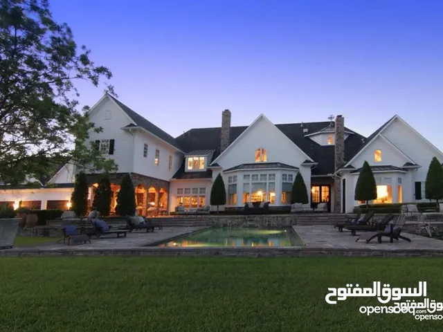 فيلا فى حى قطر على الرئيسي على شارعين مساحة الارض 600.م والمسقوف 320.م ..بها محلات ...