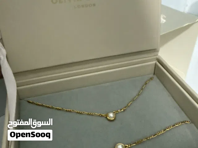 طقم Olivia Burton أصلي جديد نسائي عقد وأسوارة لون ذهبي مع لؤلؤة