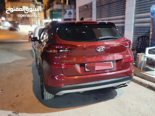 هونداي توسان 2019  فل إضافات  جنط مغنيسيوم كراسي جلد لون خمري كهرباء  فتحة سقف بانوراما تدفئة وتبريد