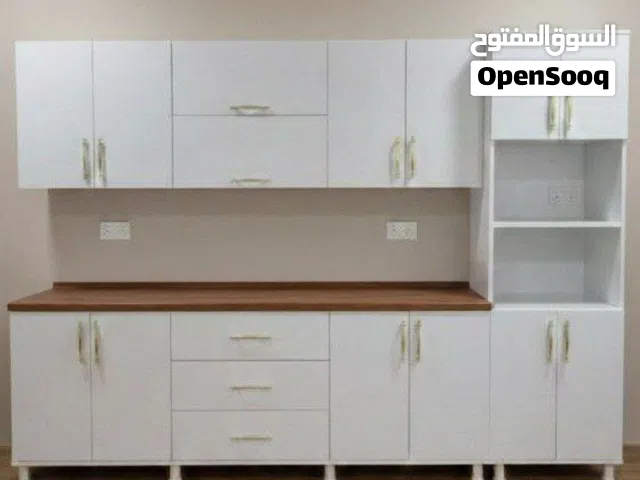 كاونتر خشب mdf قياس مترين ونص مع الفاترينا وسنك متر و20 مرمر