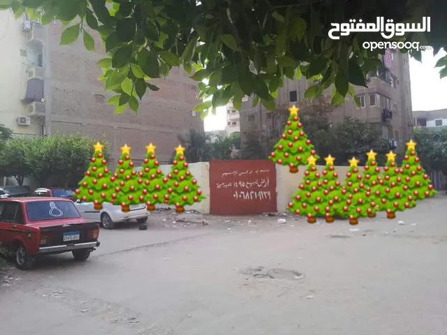 ارض للبيع القاهرة حدائق حلوان شارع محطة مترو الأنفاق ناصية شارع عبد السلام الخبيرى
