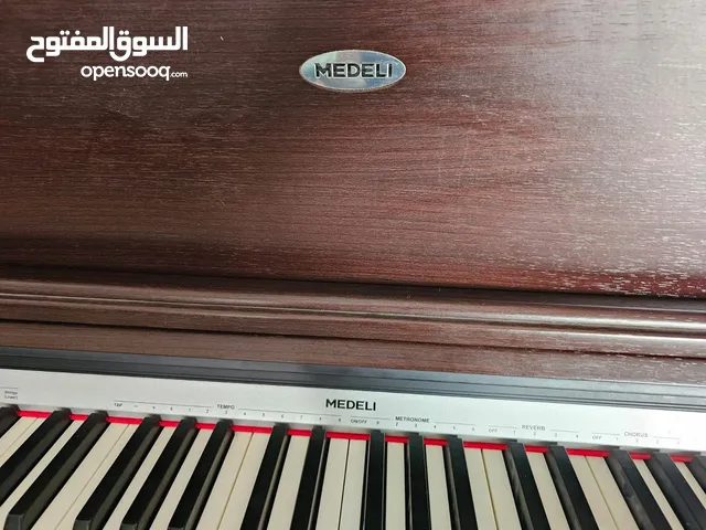 بيانو جديد غير مستخدم