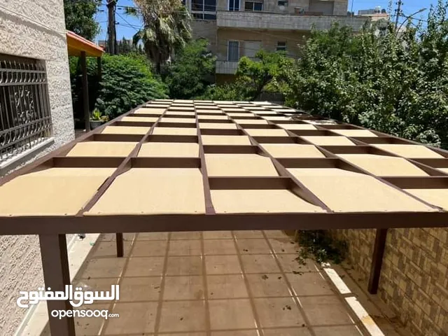 تركيب مظلات كرميد خشب براجوالات