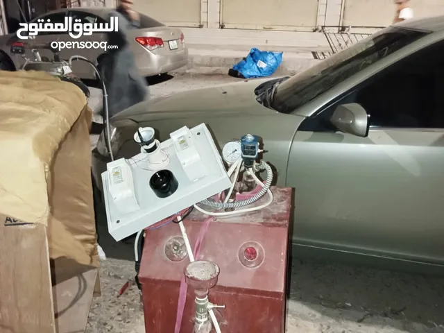 نورڤة (مكواة) ملابس تعبئة ماء يدوية