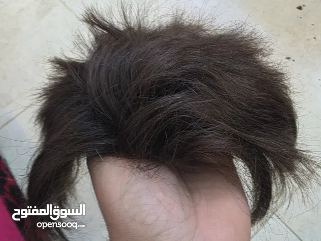 بوستيجة شعر باروكة