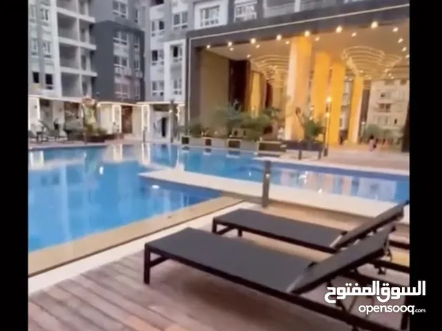 محليين للايجار متجاورين للايجار مساحة 114م علي شارع الجامعة الحديثة به حمام وغرفة مخزن