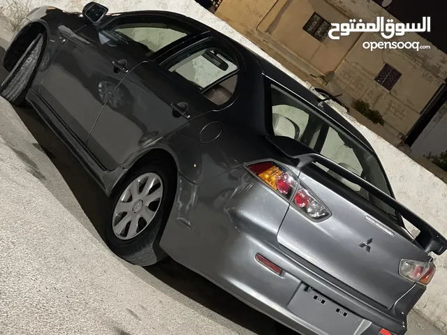 ميتسوبيشي لانسر فراشة موديل 2016 فحص 3جيد 1ضربة على الراس السيارة فل كامل فتحة وجلد السيارة نضيفة