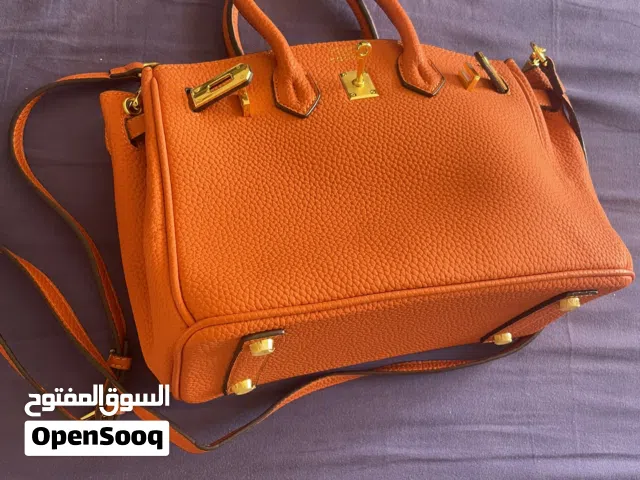 شنطة يد محفظة