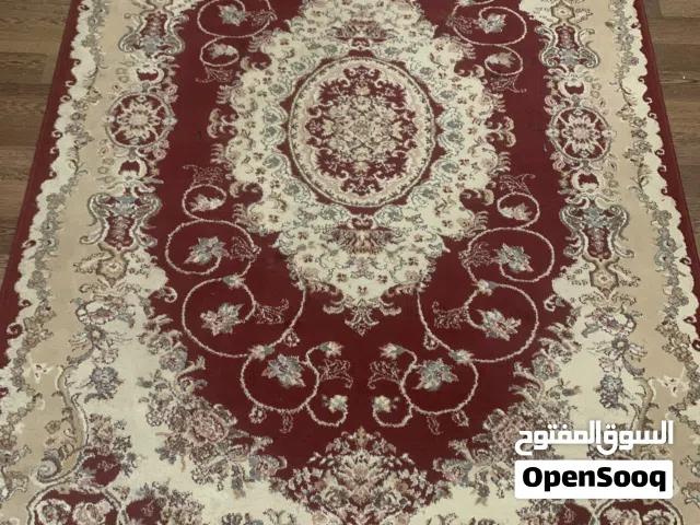 سجاد لون خمري