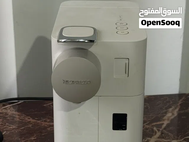 ماكنه Nespresso كبسولات شبه جديده شغاله ميه بالميه