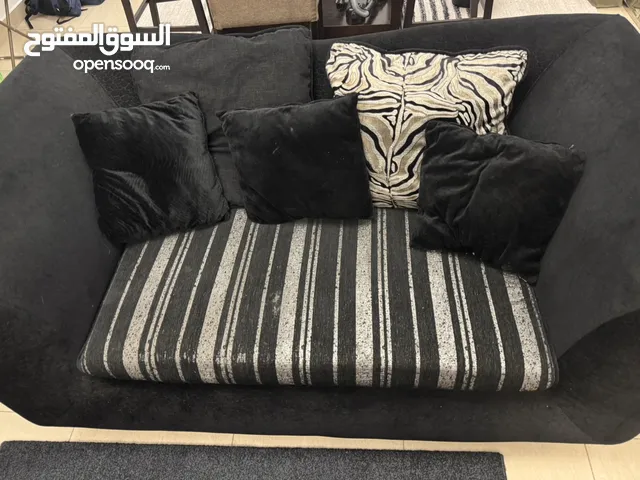 “7-seater sofa set with TV stand and 4-seater dining table for sale.”