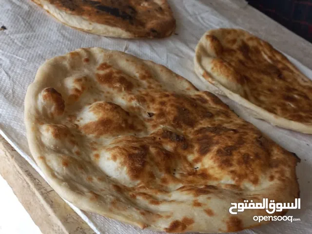خبز التنور الطازج يصل لباب الحوش والتوصيل مجانا لكآفة المناطق داخل بنغازي